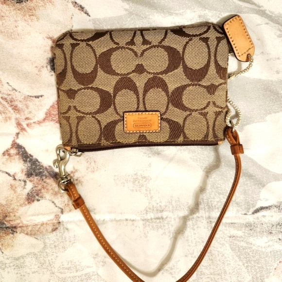 Authentic Coach signature Brown and Tan wristlet. - Picture 1 of 5